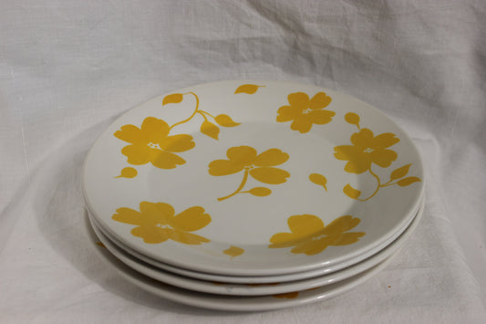 Assietes a motif fleurs jaune